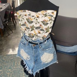 Multi colored strapless bodysuit.